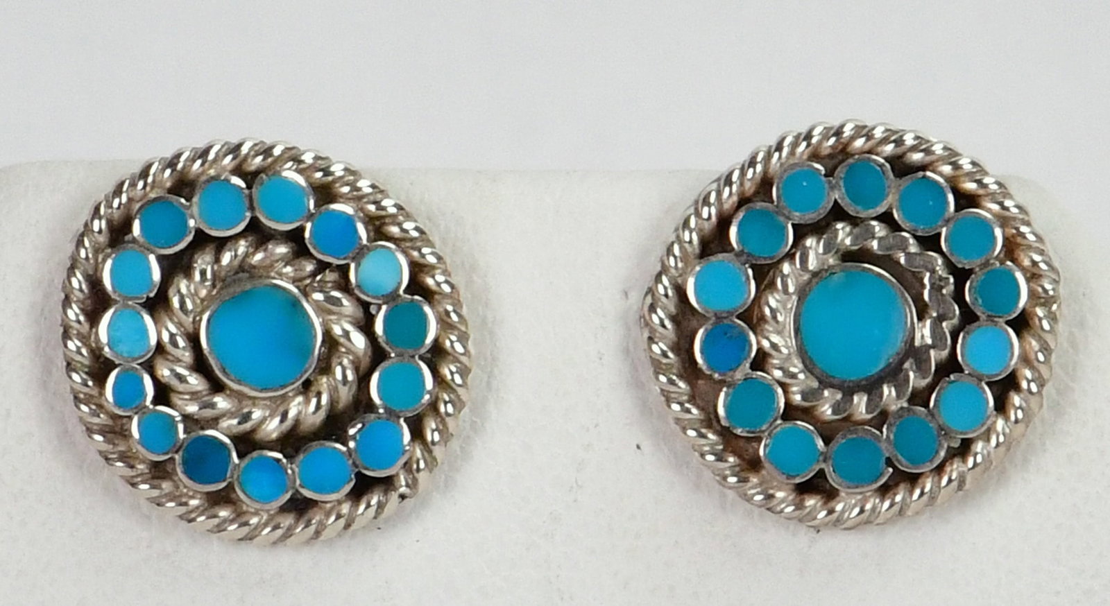Native American, Zuni, Sterling Silver Kingman Turquoise Flush Inlay Button Earrings: Sterling Silver| Native American, Zuni, Sterling Silver Kingman Turquoise Flush Inlay Earrings| Genuine Kingman Turquoise| Measure 5/8" in Diameter" Hand Signed in Script on the back of 1 Earring| Flu