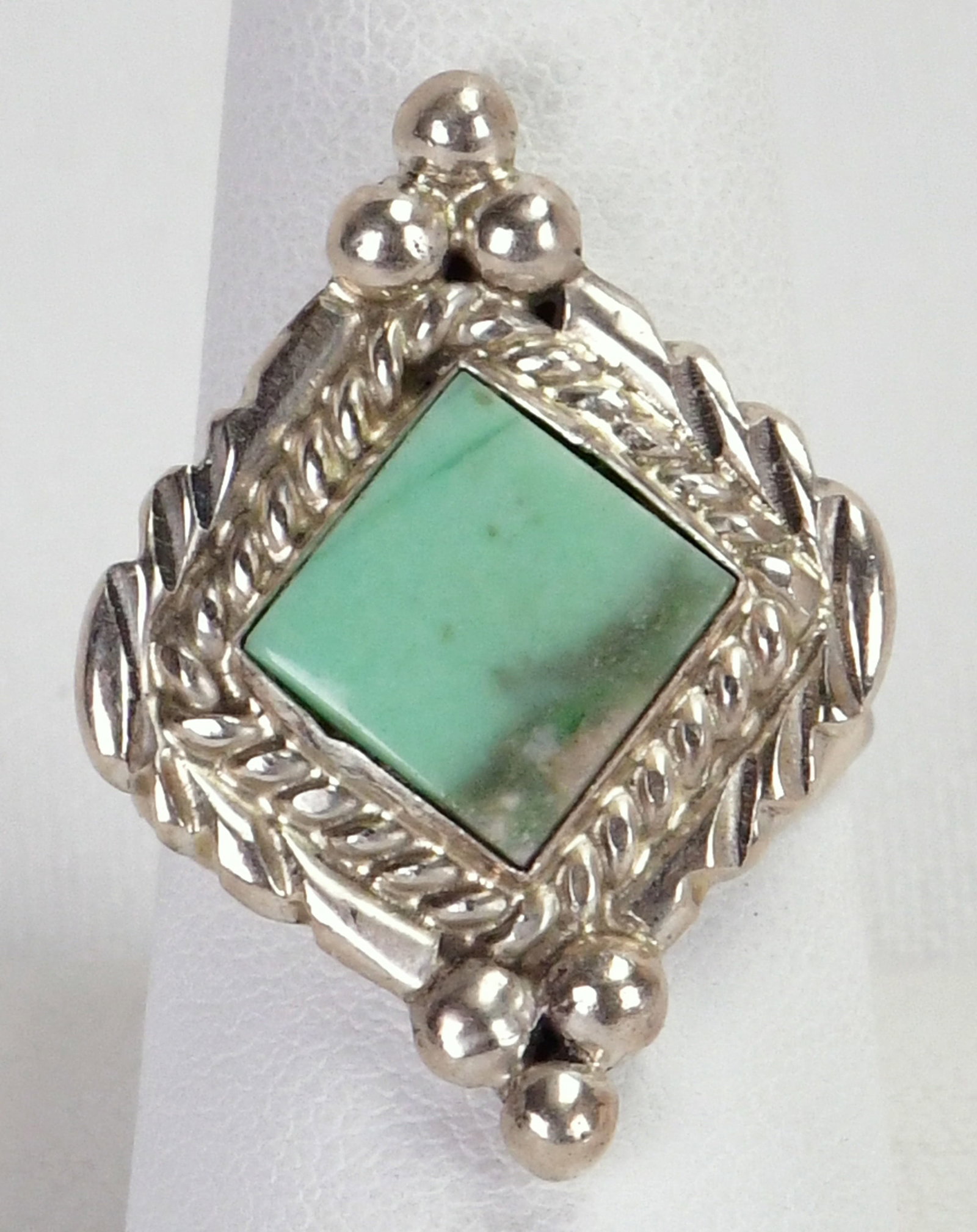 Edison Yazzie Sterling Silver Nevada Turquoise Ring - Size 9: Sterling Silver| Edison Yazzie Sterling Silver Nevada Turquoise Ring| Genuine Nevada Turquoise| Measures 1 1/8" Long x 1"Wide| Has Diamond Cut Center stone with bead and rope frame| Stamped Sterling|