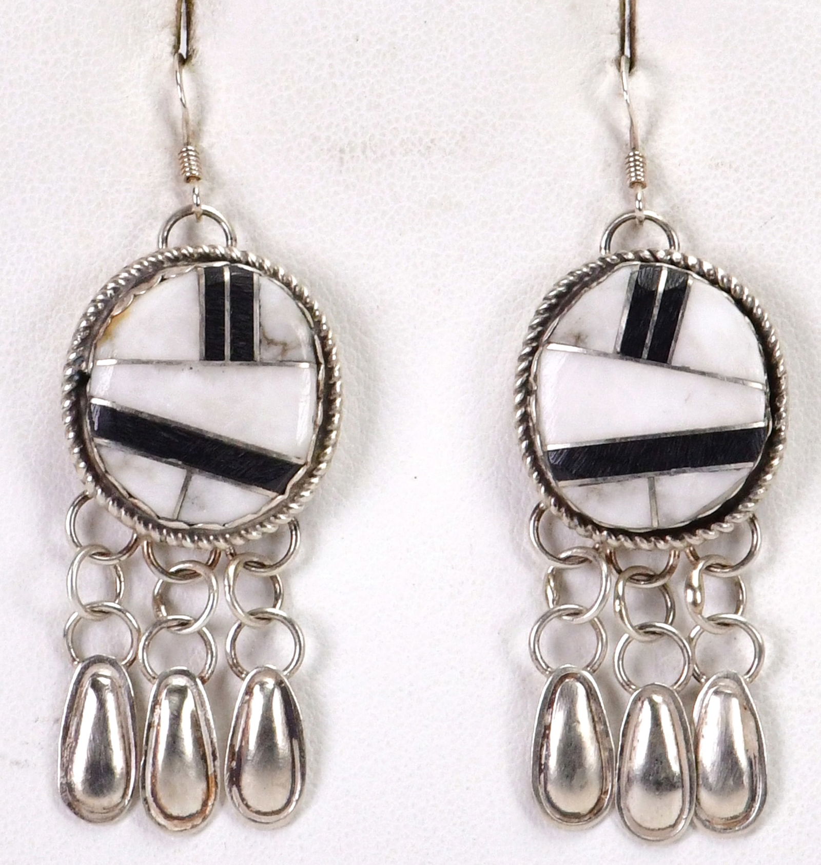 Navajo, Sterling Silver White Buffalo Turquoise & Jet Inlay Earrings: Sterling Silver| Navajo, Sterling Silver White Buffalo Turquoise & Jet Inlay Earrings| Genuine White Buffalo Turquoise, Genuine Jet| Measures 2.5" Long x 7/8" Wide| Unsigned| Weigh 15.3 Grams| Native