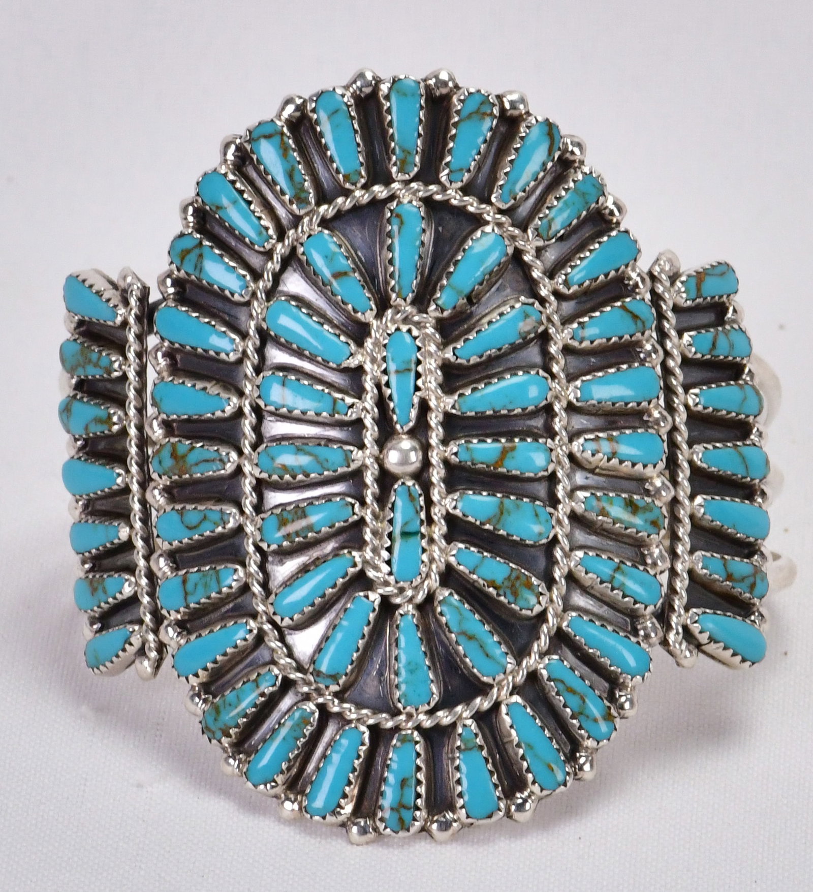 Native American Sterling Silver Large Block Turquoise Cluster Cuff: Sterling Silver| Native American Sterling Silver Large Block Turquoise Cluster Cuff| Block Turquoise| Inside measures 5.5" plus a gap of 1.5" - Total 7"| Face Width 2.75"| Hallmarked "S"| Weighs 44.3