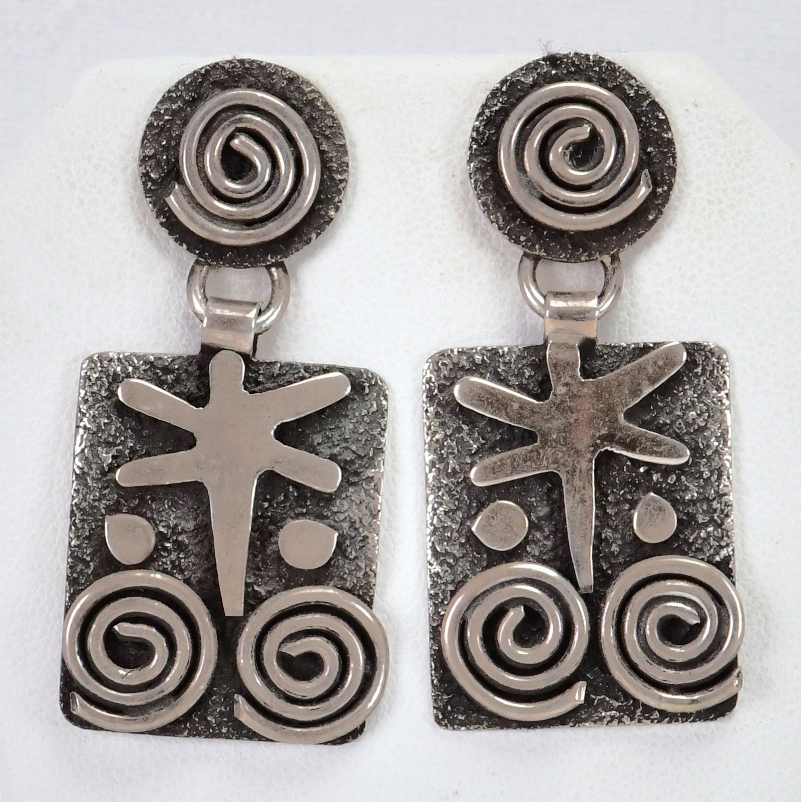 Navajo, Alex Sanchez, Sterling Silver Petroglyph Dangle Earrings: Sterling Silver| Navajo, Alex Sanchez Sterling Silver Petroglyph Dangle Earrings| All Sterling Silver| Measures 1.75" Long x " Wide| Signed| Weighs 20 Grams| Native American, Navajo, Southwestern Indi
