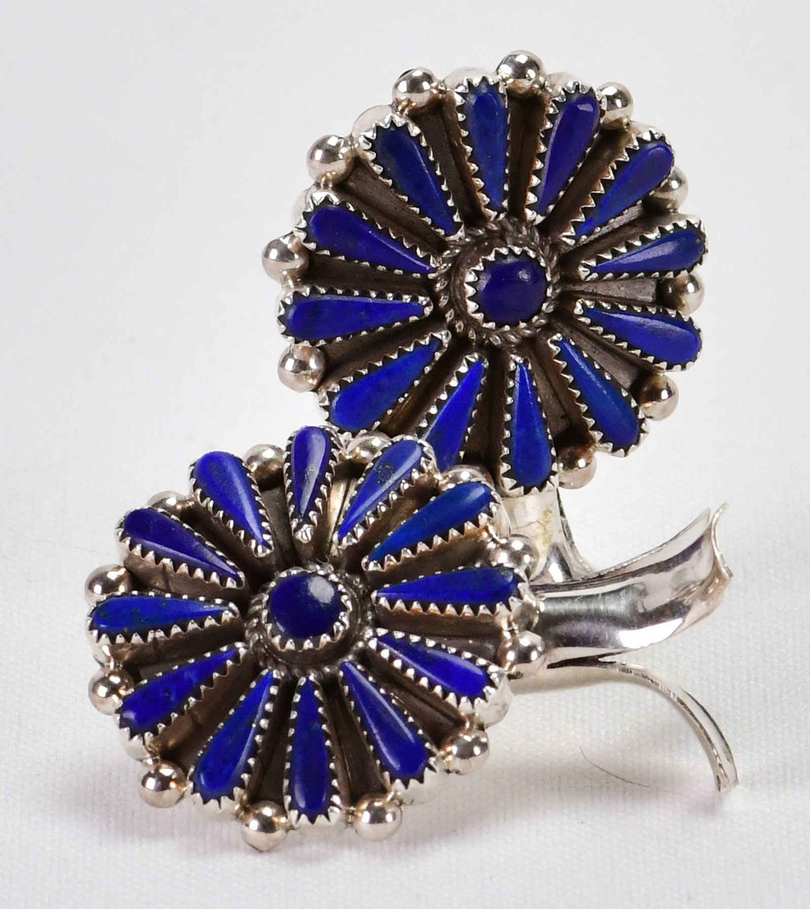 Kyle Wilson, Navajo, Sterling Silver Lapis Lazuli Squash Blossom Earrings: Sterling Silver| Kyle Wilson, Navajo, Sterling Silver Lapis Lazuli Squash Blossom Earrings| Genuine Lapis Lazuli| Measures 1.5" Long x 1 1/8" Wide| Hallmarked "KW"| Weigh 16.9 Grams| Native American,