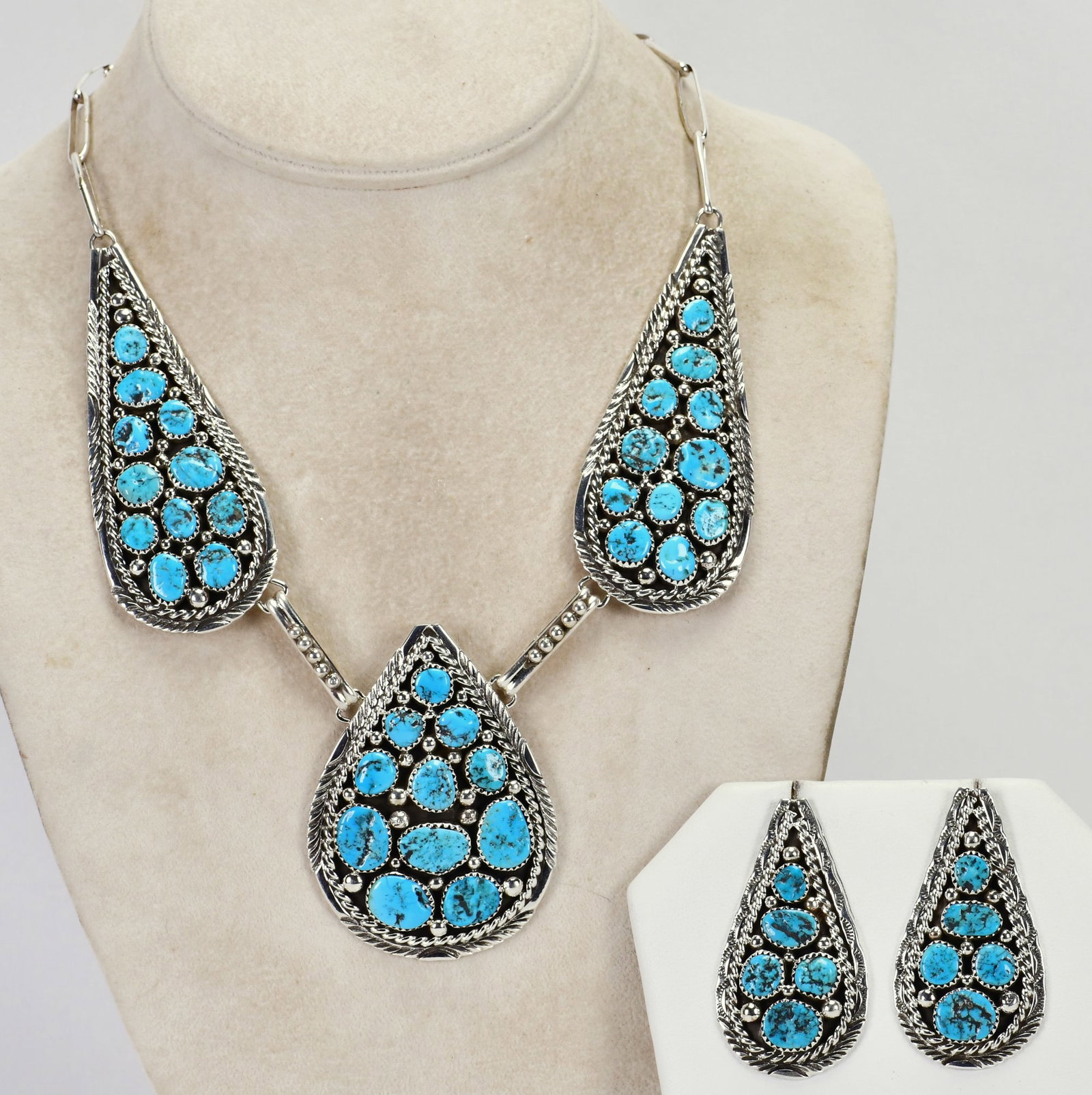 Navajo Sterling Silver Sleeping Beauty Turquoise Necklace & Earring Set: Sterling Silver| Navajo, Sterling Silver Sleeping Beauty Turquoise Necklace and Earring Set| Genuine Sleeping Beauty Turquoise| Necklace measures 19" Long {Without the Center Drop section}| Has a hand