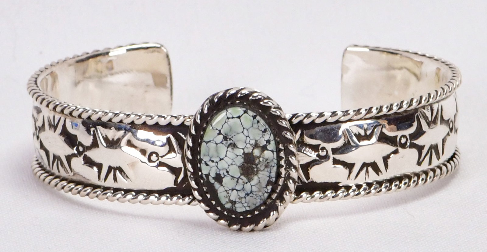 Jason B Sterling Silver Dry Creek Turquoise Cuff Bracelet: Sterling Silver| Jason B. Sterling Silver Dry Creek Turquoise Cuff Bracelet| Genuine Dry Creek Turquoise| Inside measures 5.75" plus a gap of 1" - Total 6.75" - Face Width 3/4"| Signed| Weighs 41.8 Gr