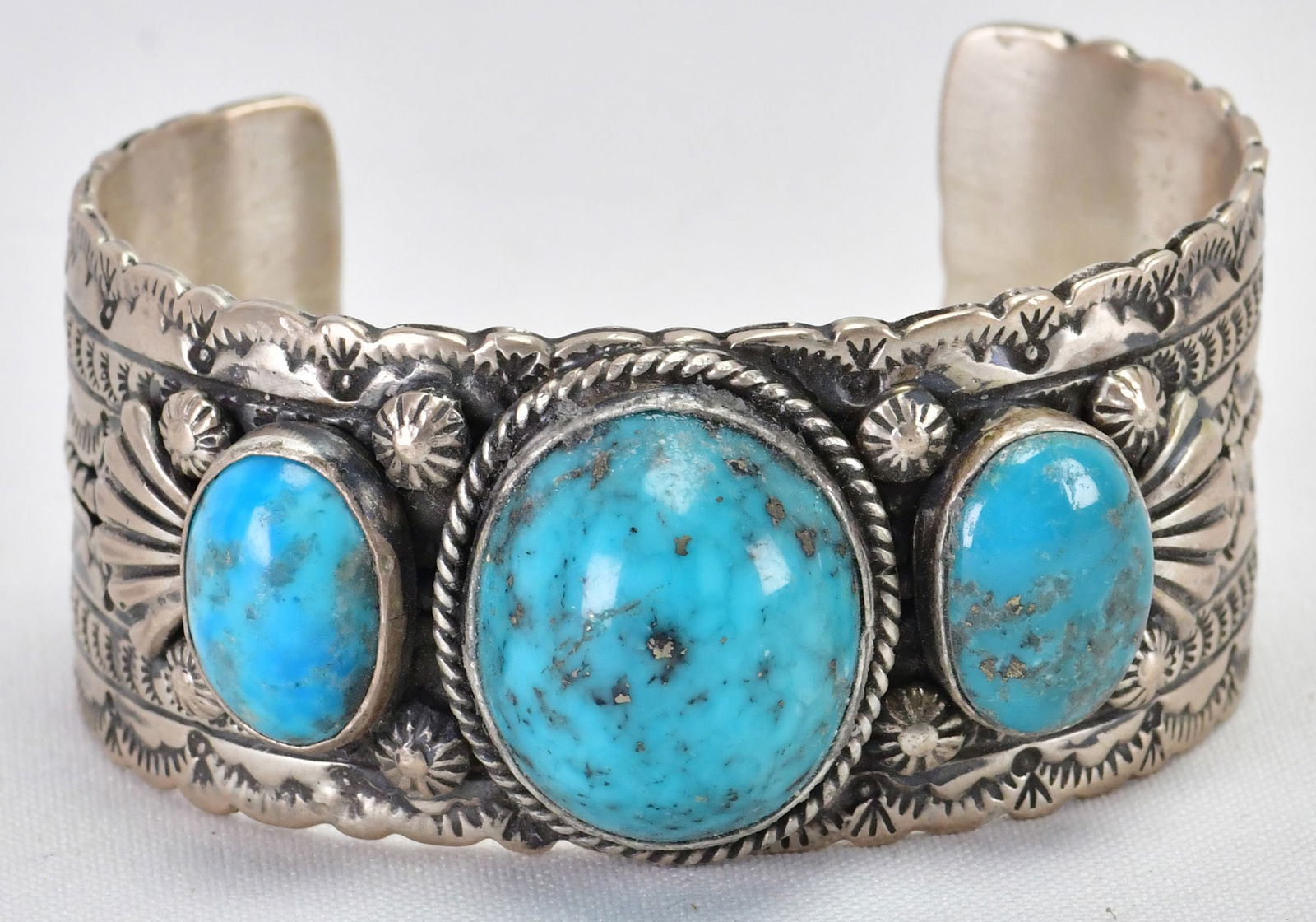 Vintage, B. Begay Sterling Silver Pilot Mountain 3 Stone Cuff Bracelet: Sterling Silver| Vintage, B. Begay, Sterling Silver Pilot Mountain 3 Stone Cuff Bracelet| Genuine Pilot Mountain Turquoise| Has 3 Large Domed Turquoise stones across the top| Inside measures 5.5" plus