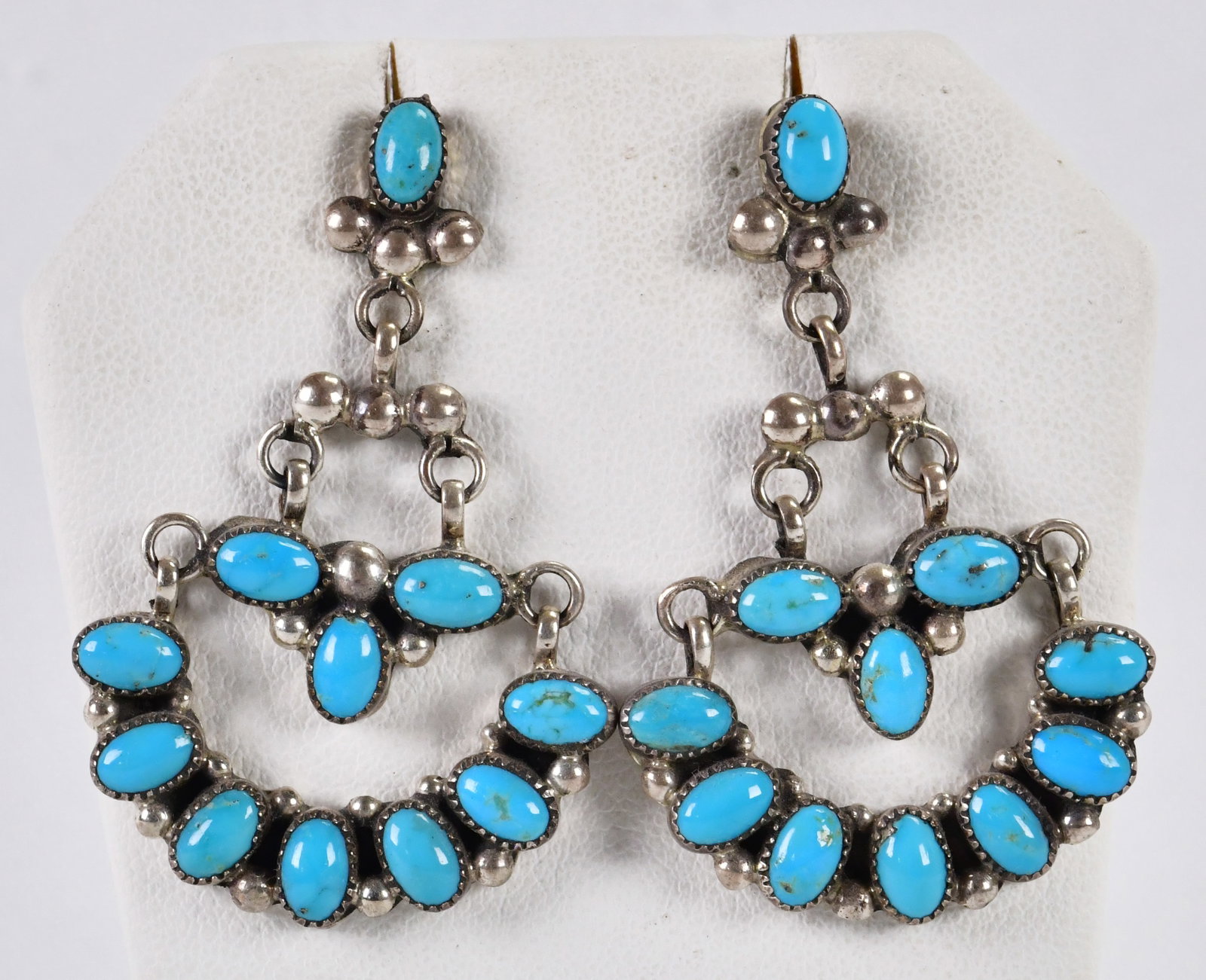 H. Etsitty Sterling Silver Sleeping Beauty Turquoise Earrings: Sterling Silver| H. Etsitty Sterling Silver Sleeping Beauty Turquoise Earrings| Genuine Sleeping Beauty Turquoise| Measures 2" Long x 1 1/8" Wide| Signed| Weigh 13.6 Grams| Beautiful Matched Cabochon 
