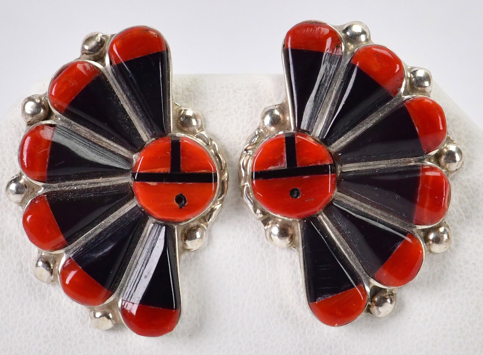 Wilton Niiha Mediterranean Coral & Black Onyx Sunface Earrings: Sterling Silver| Zuni, Wilton Niiha Sterling Silver Mediterranean Coral and Black Onyx Sunface Earrings| Genuine Mediterranean Coral, Genuine Black Onyx| Done in a raised or Cobblestone Inlay these ea