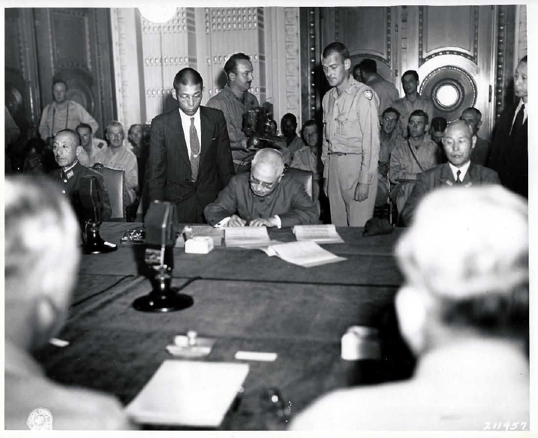 Japanese Officer signs the surrender. Kiejo Korea 1945 (1 of 3)