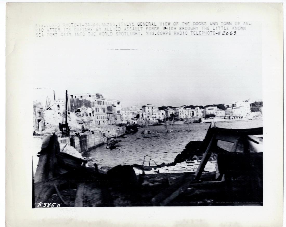 View of War Torn Anzio Italy. Radiophoto 01 .31.1944: Radio Telephoto 01/31/1944 Anzio, Italy. General View Of The Docks And Town Of Anzio After Its Capture By Allied Force Which Brought The Little Known Sea Port City Into The World Spotlight. Sig. Corps