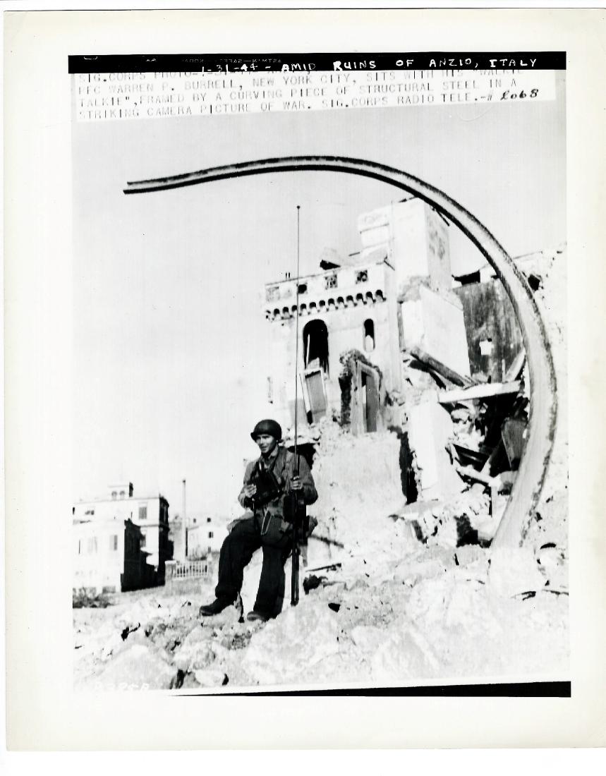 Ruins of Anzio, Italy U.S.S.C Radiophoto, 1.31.1944: Radio Telephoto 01/31/1944 Amid Ruins Of Anzio, Italy Pfc Warren P. Burrell, New Yourk City, Sits With His Walkie Talkie, Framed By A Curving Piece Of Structural Steel In A Striking Camera Picture Of 