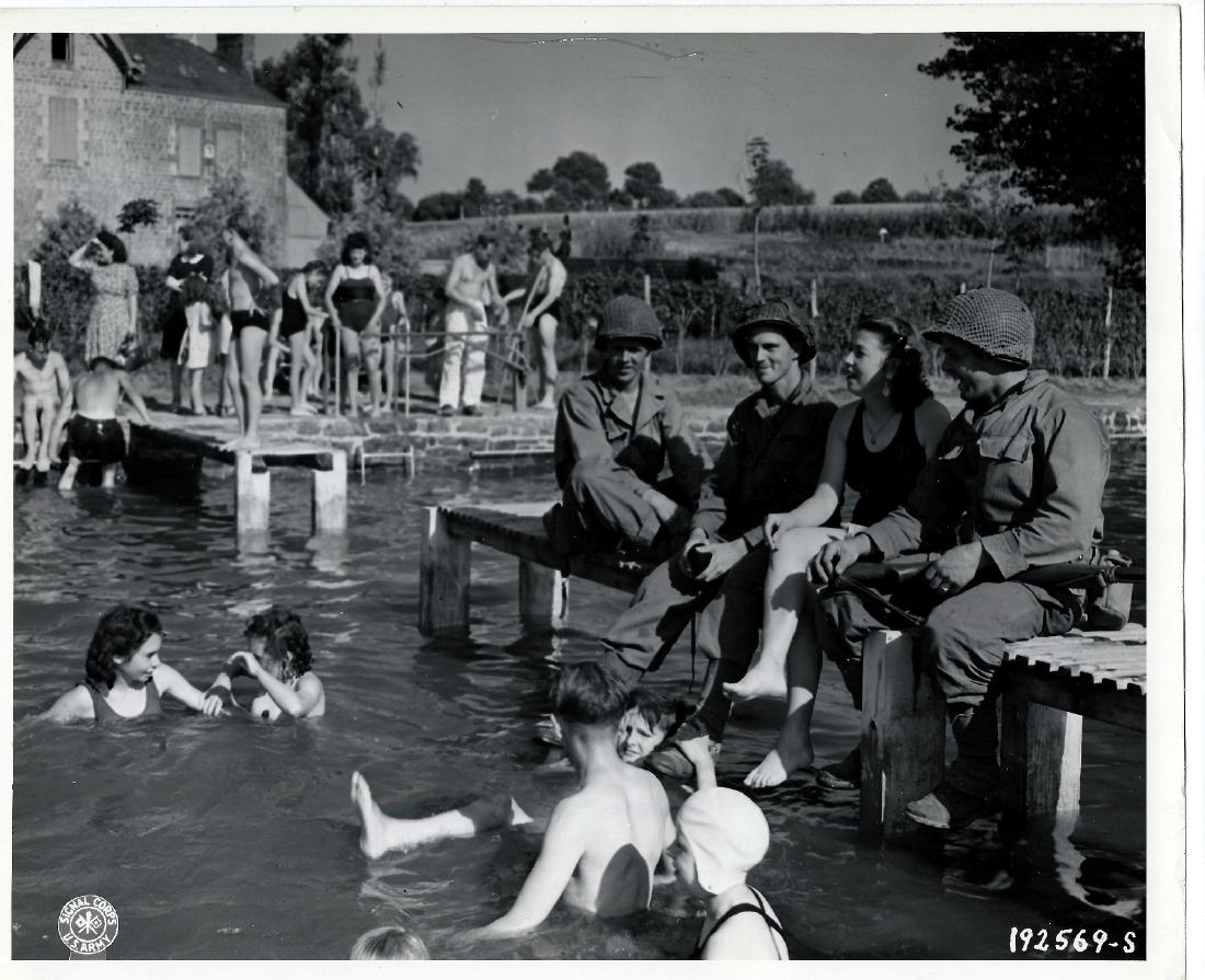 GIs by the local pool Gorron, France. August, 1944 (1 of 3)