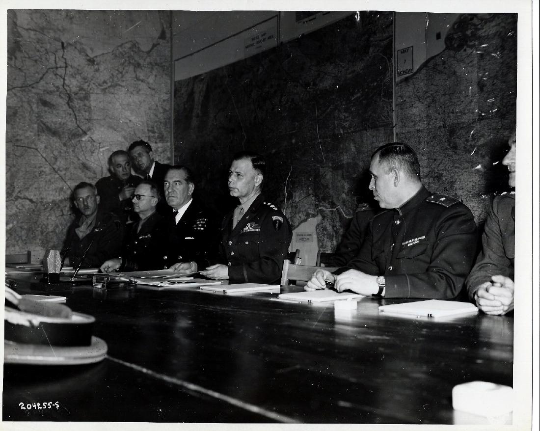 Chiefs of Staff sign Nazi surrender. 5.6.1945 Reims: Original Authentic 1945 W.W.II. U.S. Signal Corps Photo 204255 of Nazi Surrender. Seated at table of Supreme Allied Headquarters, Reims, France, Allied Chiefs of Staff prepare to signature uncondition