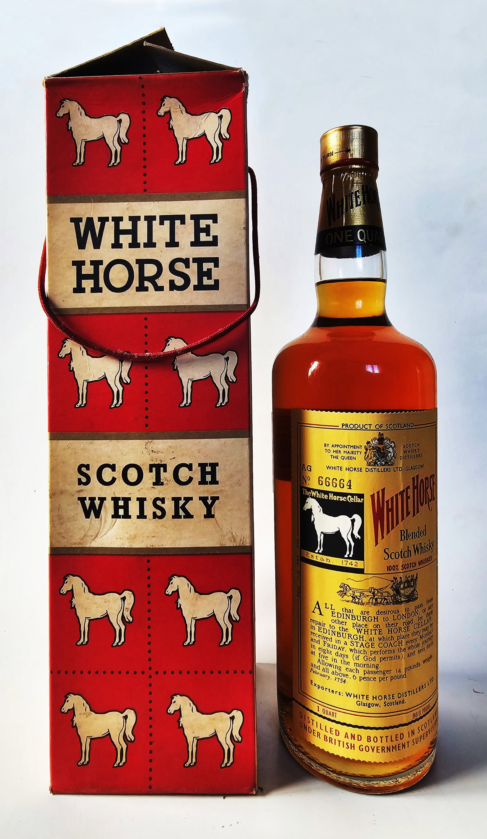 White Horse Scotch 1 Qt, No. AG 66664, c.1970, 86.8 Proof: White Horse Scotch 1 quart, Bottle Number AG 66664, c.1970s, 86.8 Proof. Clear glass bottle, yellow label, screw cap with gold capsule printed in black. Paper wrapped, Labels in place. Perfect fill wi
