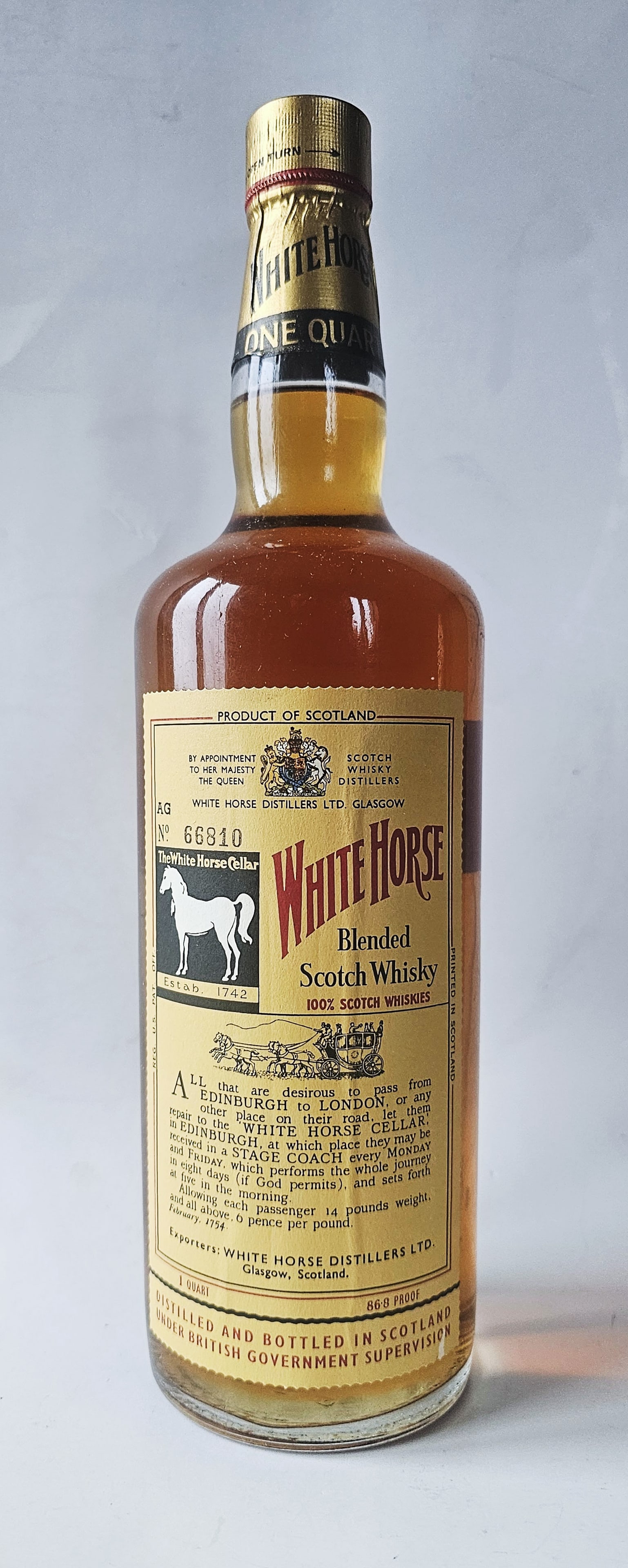 White Horse Blended Scotch 1970s  Bottle AG No. 66810 (1960s).   Size 1 quart, 86.8 proof.   White (1 of 5)