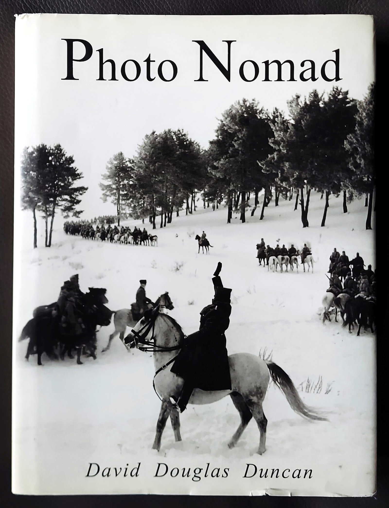 David Douglas Duncan: Photo Nomad 2003 First Edition: Photo Nomad by David Douglas Duncan (1916-2018). First Edition by W. W. Norton & Company, London, 2003. Hardcover in Royal blue cloth with embossed title on cover and gold gilt font on spine, 464 pps,