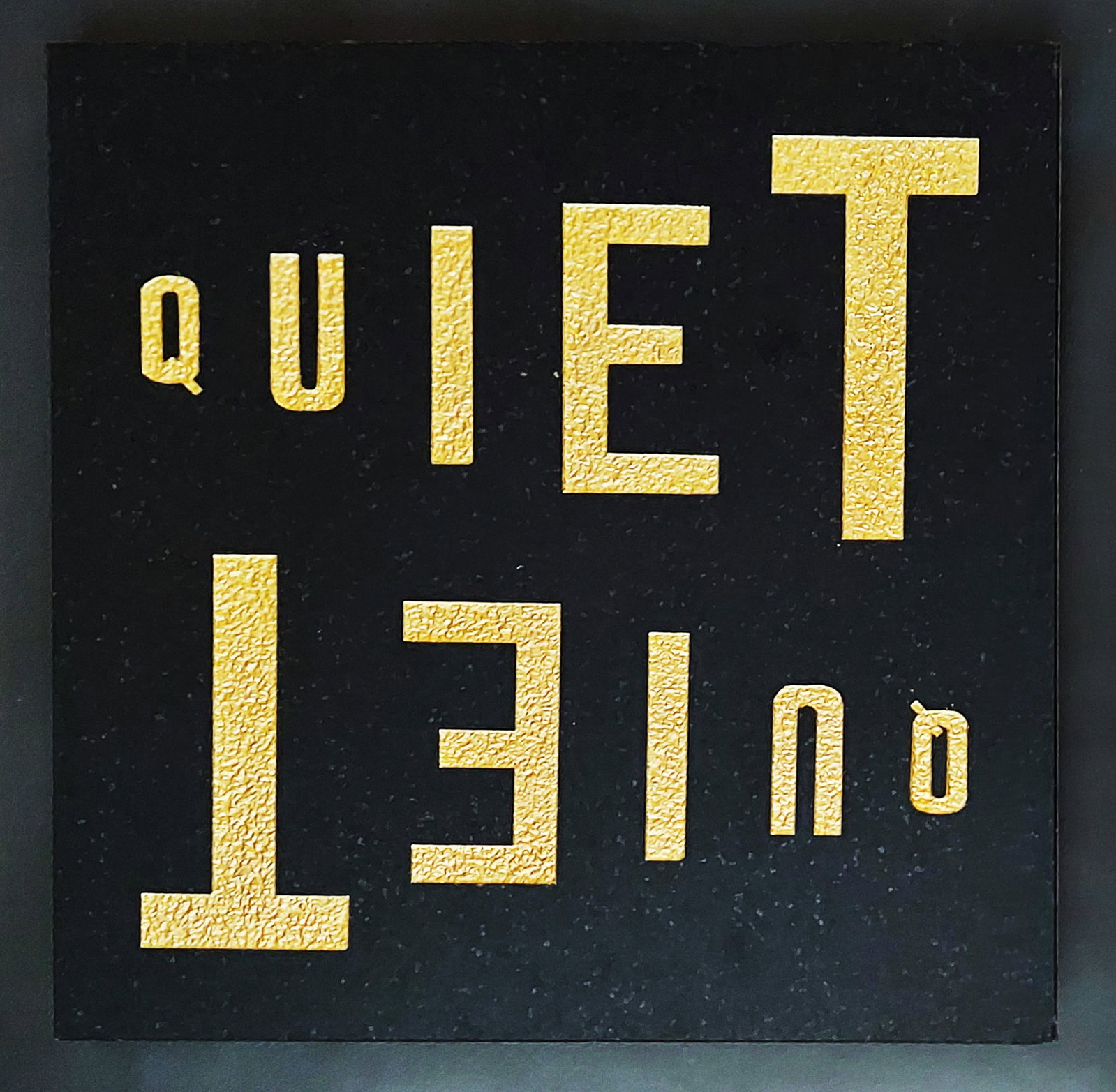 Richard Tipping: Quiet, the Shouting Zone, 1998 Carved Granite, Gilt: Richard Tipping (Australia, b.1949): Quiet, the Shouting Zone, 1998. Gilded Carving on Granite, wood backing. Dimensions: 12 x 12 inches. Signed, inscribed, and dated in marker on verso: Shouting Zone