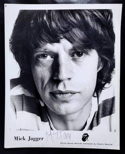 The Rolling Stones Mick Jagger Signed Photo, 1981: Photograph of The Rolling Stones front man Mick Jagger signed by Jagger in ball pen at the bottom margin in 1981. Dimensions: 8x10 inches Two concert photos 5x7 of September 26, 1981 11AM performance