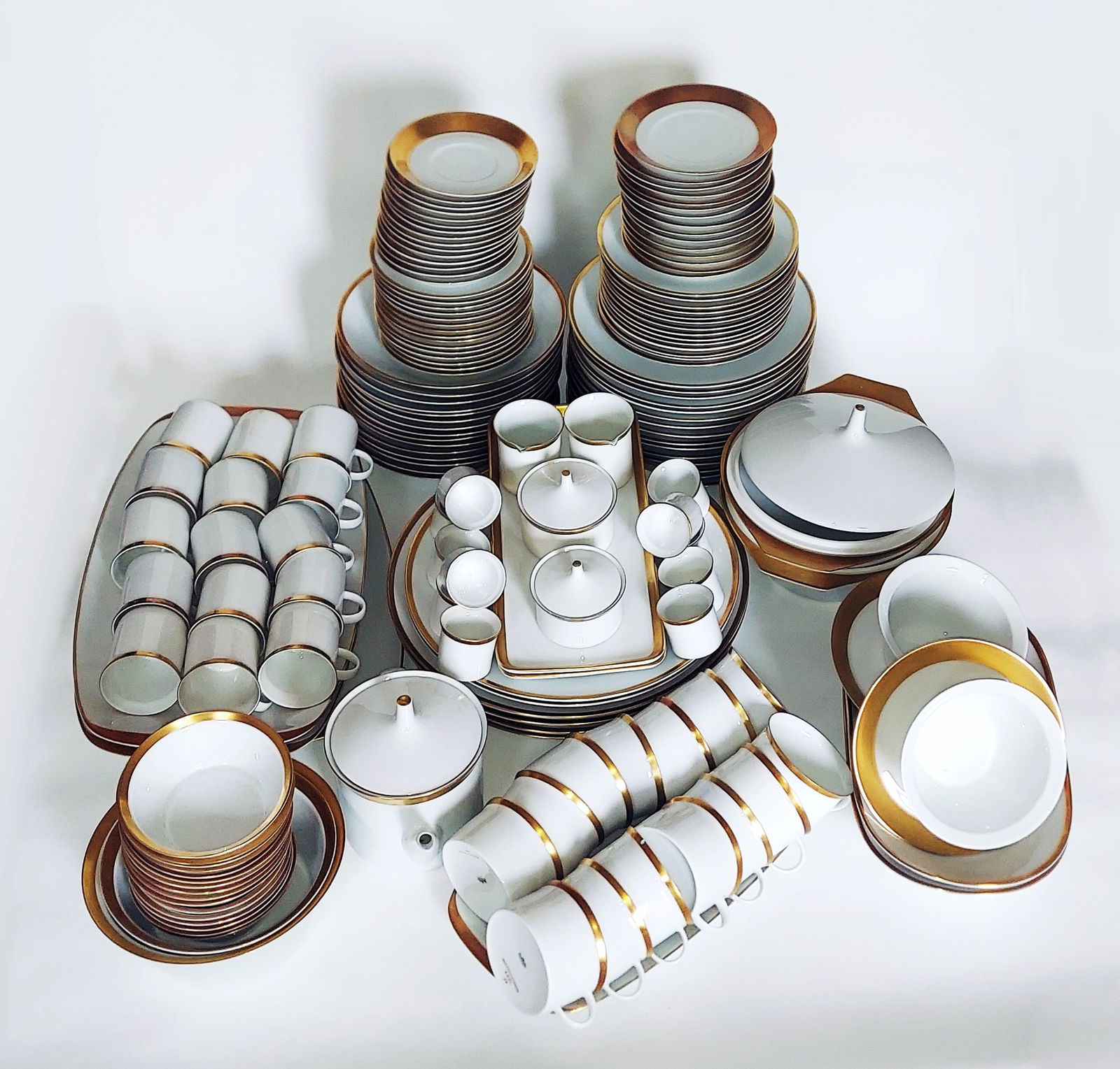 Rosenthal Porcelain Dinnerware Set 169-pieces 1952 Germany: 1952 Rosenthal Berlin KURFURSTENDAMM Dinnerware set White Porcelain Gold Trim. Classically beautiful tableware from Rosenthal: white porcelain with a gold rim. Round platter 6 (2 flat, 2 large, 2 medi