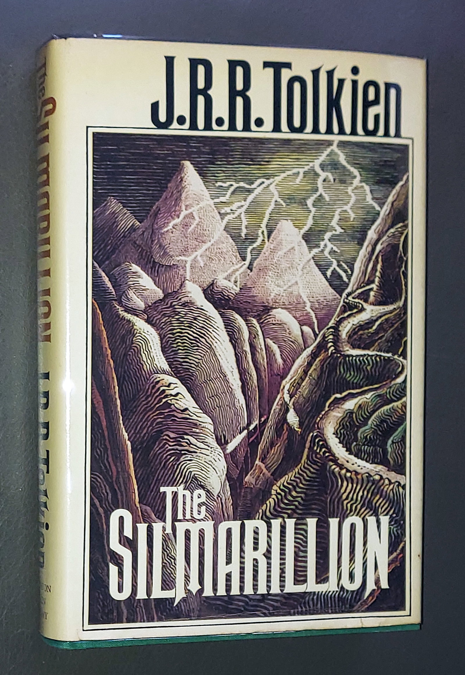 J.R.R. Tolkien: The Silmarillion 1977 First American Edition: J.R.R. Tolkien: The Silmarillion 1977 Stated First Printing, First American Edition by Houghton Mifflin Company, Boston, 1977. From the estate of Lilian and Peter Grosz, son of the German artist Georg