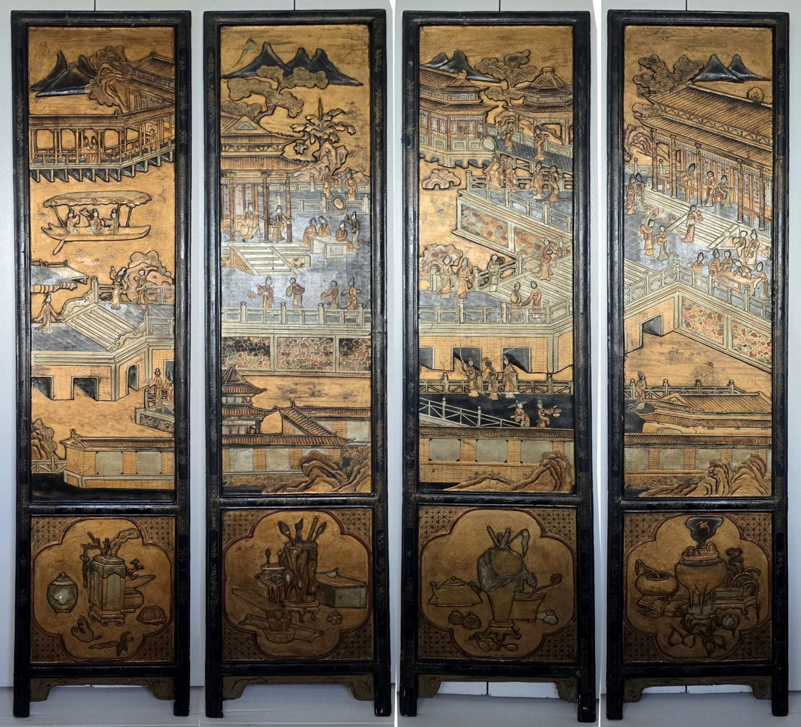 Palace Scene on Four Panels Screen, Carved & Gilt 1800s China: Finely carved in wood and gilt four screen panels with richly decorated landscape architectural vedutas. Verso executed with black and gilt lacquer inlaid floral designs. China, Qing, XVIII century. E