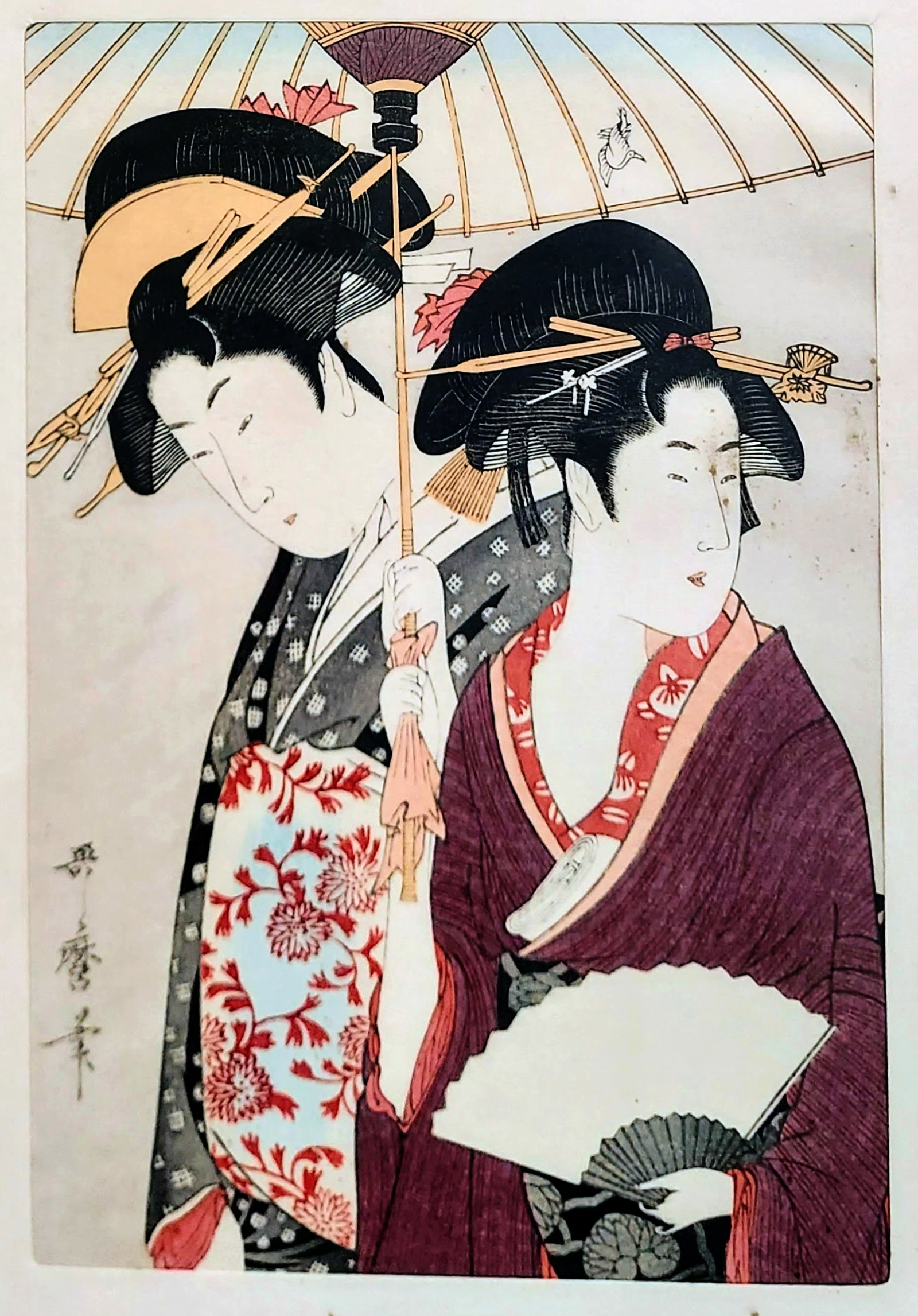 Kitagawa Utamaro: Beauty & Attendant under Umbrella, c.1800: Beauty with attendant under umbrella, from the series Pleasures for Beauties, c.1800. Color woodblock print, later print, half-oban, sight 9 x 6, frame 15 x 11 inches. Kitagawa Utamaro (Japanese, 1753