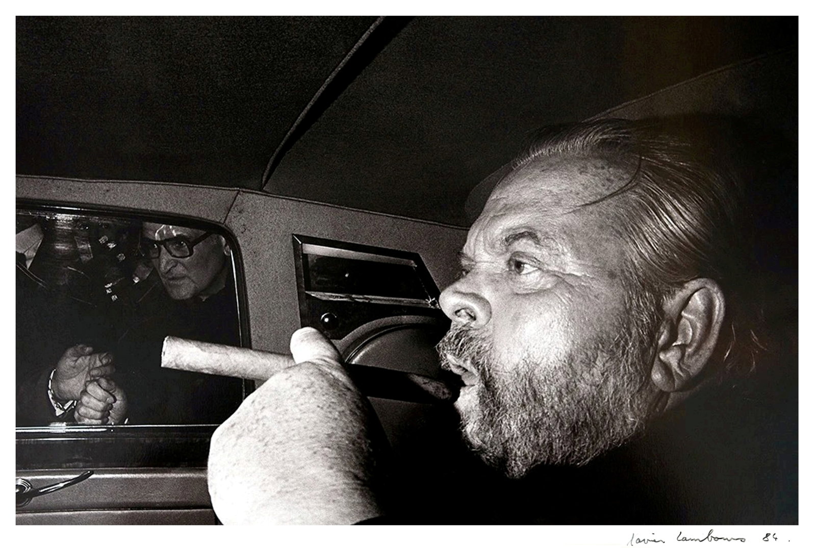 Xavier Lambours: Orson Welles at the César Awards Paris 1982: Xavier Lambours (French, b.1955) Orson Welles at the César Awards in Paris, 1982. Signed and dated at the lower right: Xavier Lambours, 1984. Gelatin silver print 1984. Frame 19.25 x 14.5, Sight 