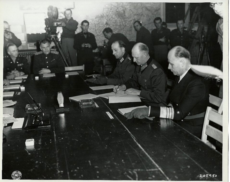 Nazis surrender at Allies HQ Reims 5.6.1945: ORIGINAL WWII PHOTO - DATED & ANNOTATED.Rare Original silver gelatin photograph by US Signal Corps, of German regime unconditional surrender signing ceremony in the war room of Supreme Headquarters Al