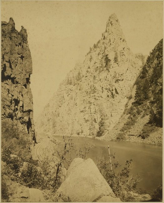 [PHOTOGRAPHY]. JACKSON, William H. “Currecanti Needle”: 487. [PHOTOGRAPHY]. JACKSON, William Henry. “Currecanti [sic] Needle,” view of Colorado landmark, Curecanti Needle, a distinct granite rock formation in the Black Canyon of the Gunnison, b
