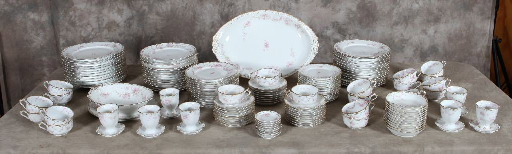 Theodore Havilland Limoges china set: 12 9 1/2plates,28 8 1/2plates,13 7 1/4 plates,13 6 1/4 plates,12 5in bowls, 8 butter pats, 7 egg cups, 20 cups, 26 saucers, 2 oval serving trays, oval server