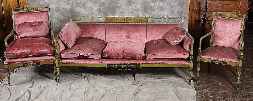 3 Piece Adam Paint Decorated Parlor Set: Consisting of a closed arm sofa and two open arm chairs all in green painted finish with hand painted back crest panels. Age: Second Quarter 20th Century Condition: Good: Damage and chipping throughou