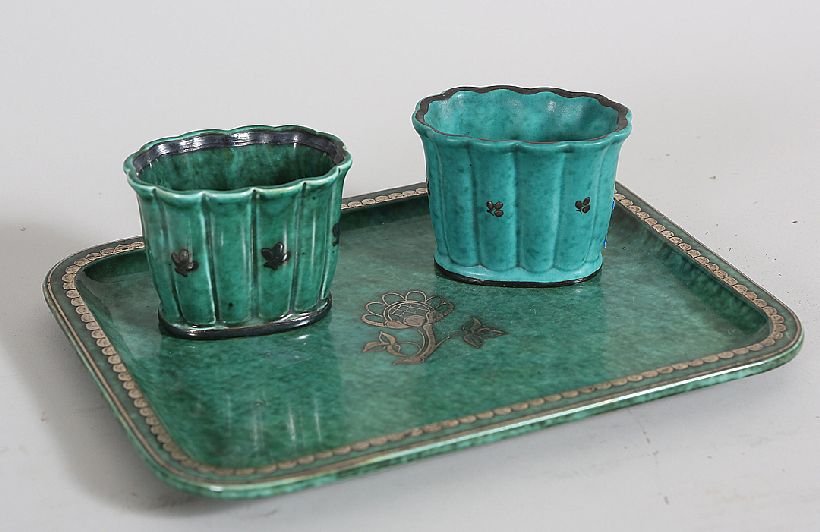 Gustavesburg Tray with Two Small Vases: Silver overlaid mottled green pottery. Age: 20th Century Condition: Good: No observed damage or roughness to the porcelain. Clean even finish with minimal observed wear or fading. Size: Tray 6.625 x 8
