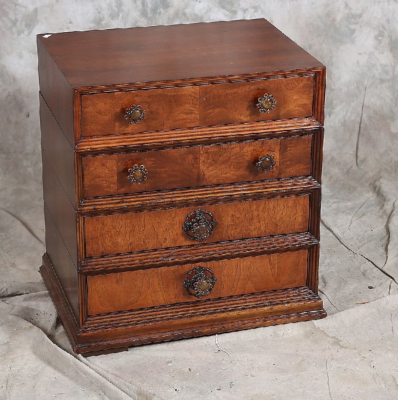 Bed Side Stand: Diminutive four drawer low or table top storage cabinet. Age: Mid 20th Century Condition: Very Good: Recently refinished with some old under finish staining and dings. Structurally sound. Size: 20w x 