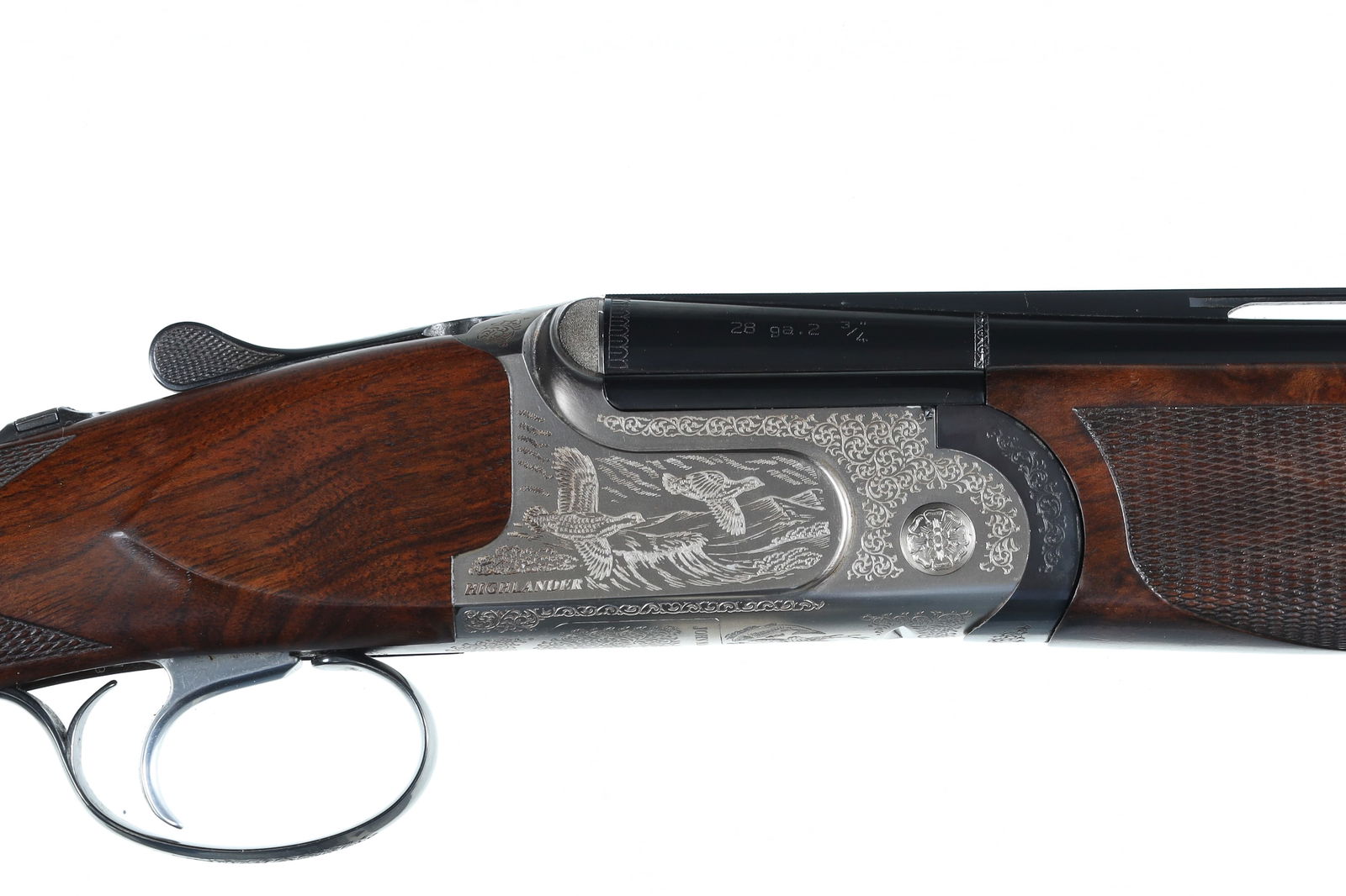 B. Rizzini MacNab Highlander O/U Shotgun 28g: 28ga Serial # 45714 Choked Imp Cyl/Mod, 2 3/4" chambers. Blue finish vent rib, game scene engraved alloy receiver, single selective trigger over checkered pistol grip stock. LOP 14 1/4", Drop 1 5/8 /