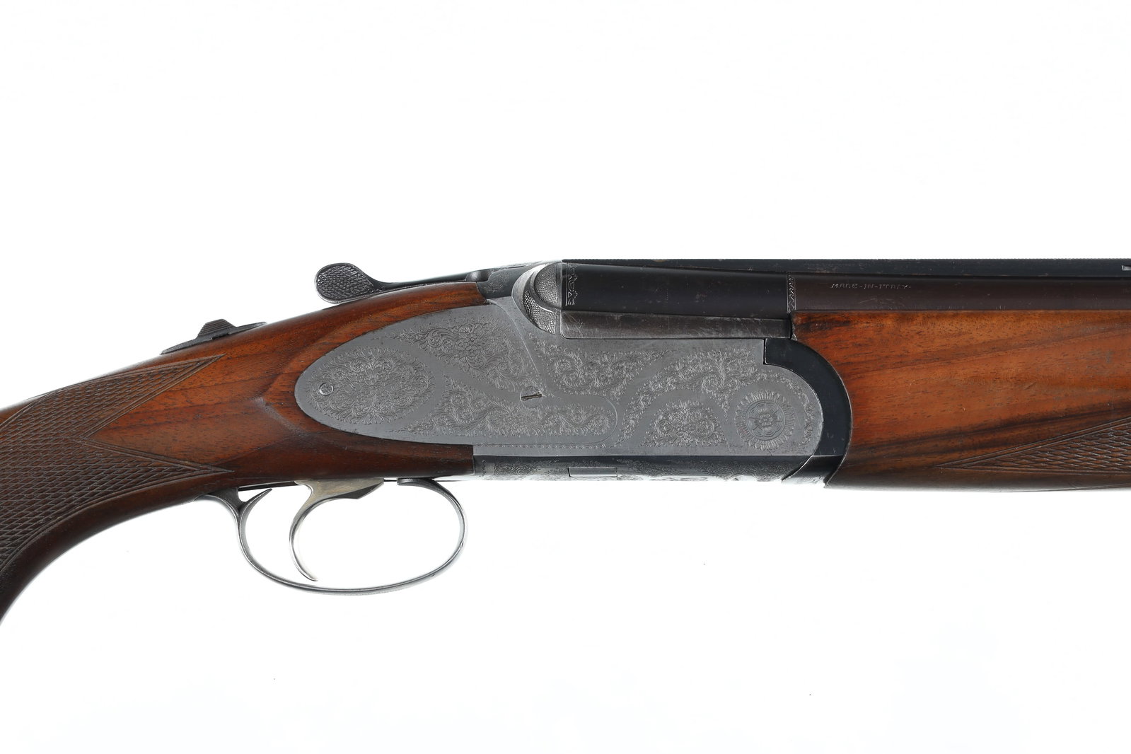 E Rizzini O/U Shotgun 12ga: 12ga Serial # 41791 Choked Imp Cyl/Mod, 2 3/4" chambers. Single selective trigger with ejectors. Sideplated boxlock with engraved receiver. Checkered pistol grip stocks. LOP 14 1/8", Drop 1 3/4"; 2 1/