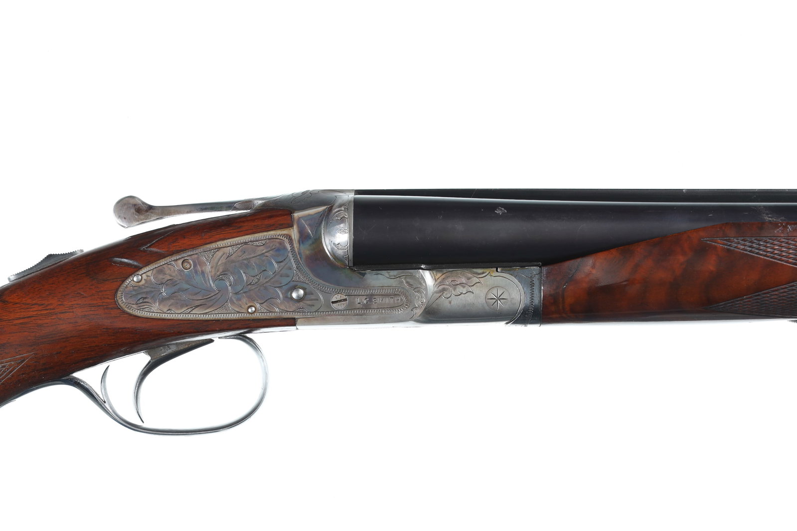 LC Smith Ideal Grade SxS Shotgun 16ga.: 16ga Serial # FW182996 Mfg, 1940. Blue finished barrels with single bead front sight, London steel? marked barrels with lifter extraction. Single Hunter trigger with checkered varnished pistol grip st