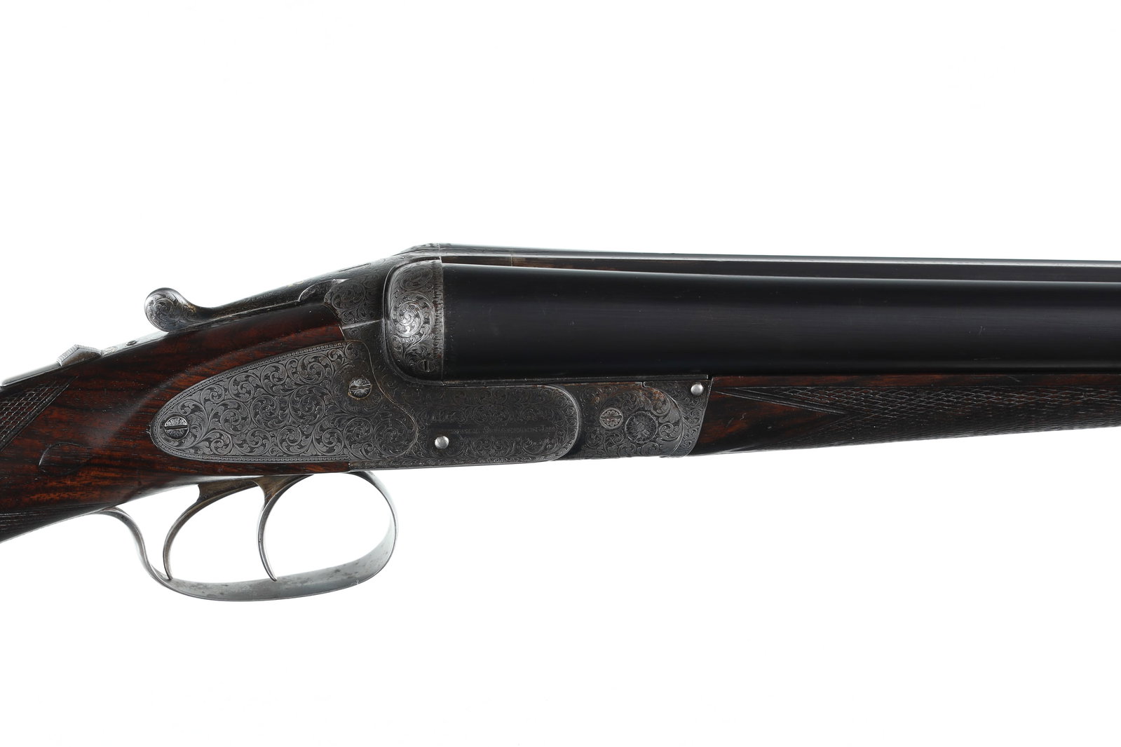 COGSWELL & HARRISON Boxlock SxS Shotgun 12ga: 12ga Serial # 27274 Choked Imp Cyl/Mod, 2 1/2" chambers, makers mark with London address atop rib. Double trigger with ejectors. LOP 15 1/4", 1 7/8" DAC, 2 3/8" DAH. Stock has extreme cast off for rig