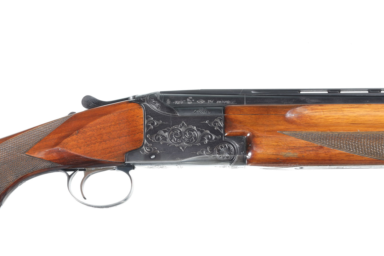 Winchester 101 O/U Shotgun 12ga: 12ga Serial # K327080 Very good overall condition with moderate wear on receiver from carry, stocks are solid with 1 minor repair on right side of forearm, and numerous small bruises and impressions. 