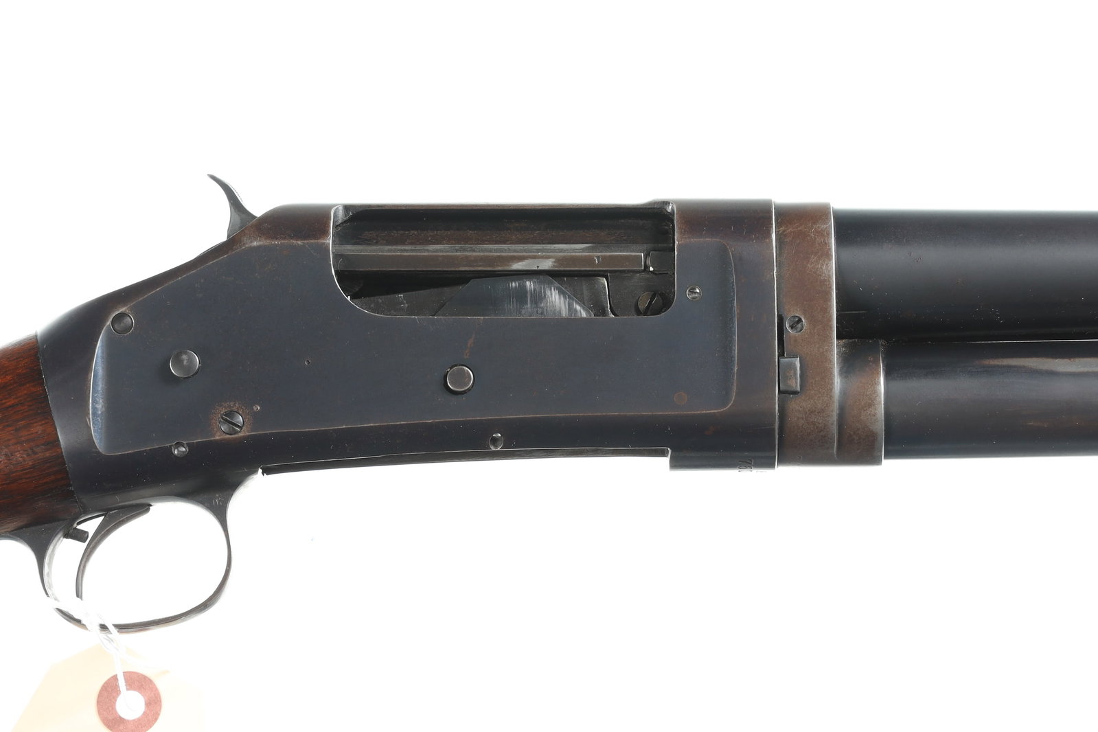 Winchester 97 Slide Shotgun 12ga: 12ga Serial # E750173 Famed Winchester Model 1897 Pump hammer shotgun. 12 ga, with exposed hammer. blue finished with varnished pistol grips stocks. Condition, Very good overall condition, fading orig