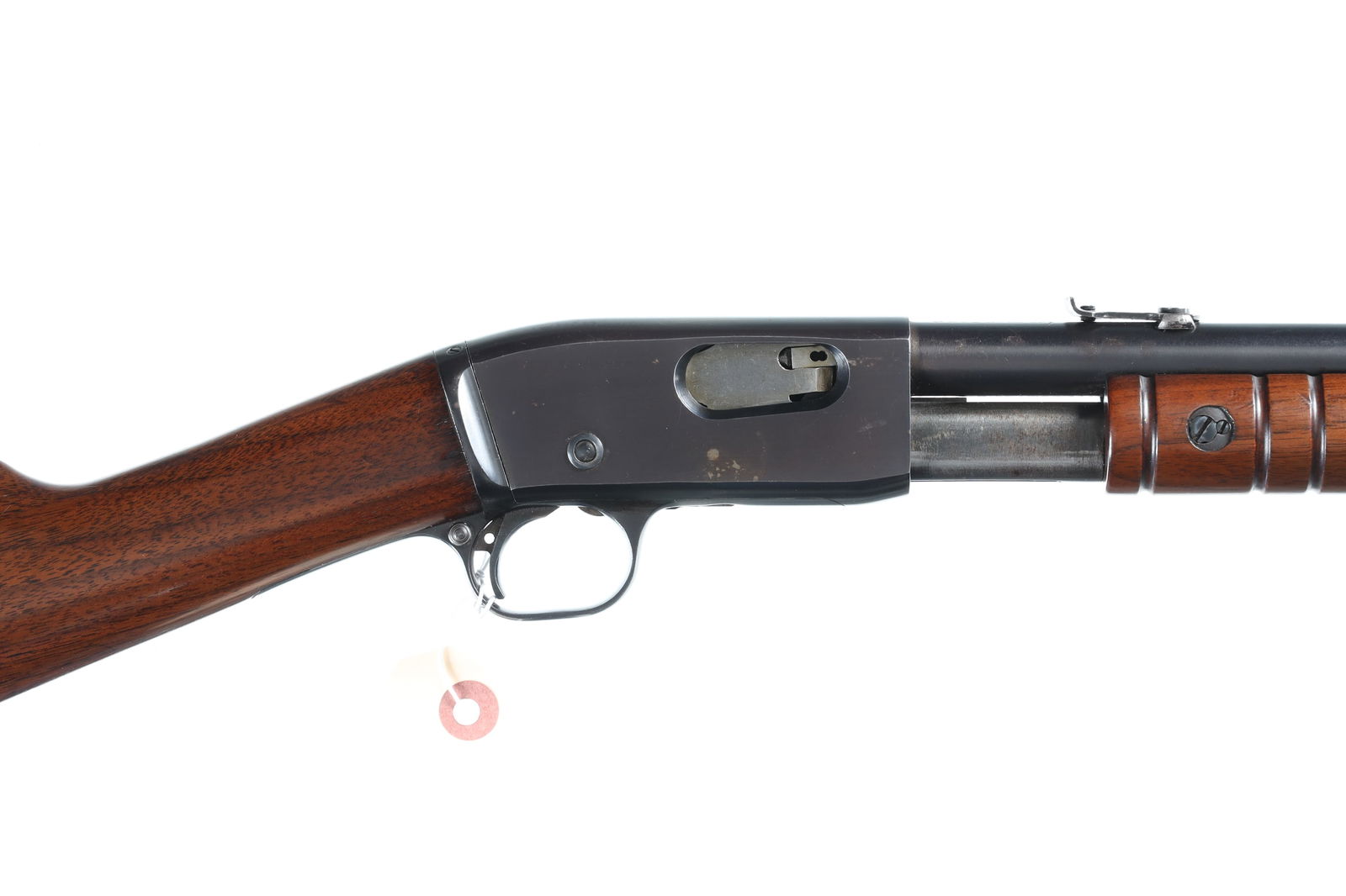 Remington 12 Slide Rifle .22 sllr: .22 sllr Serial # 819071 Pre-War Remington Model 12 Pump 22 tube fed rifle with blue finished metal and varnished walnut stocks. Metal surfaces rate near excellent retaining majority of factory finish