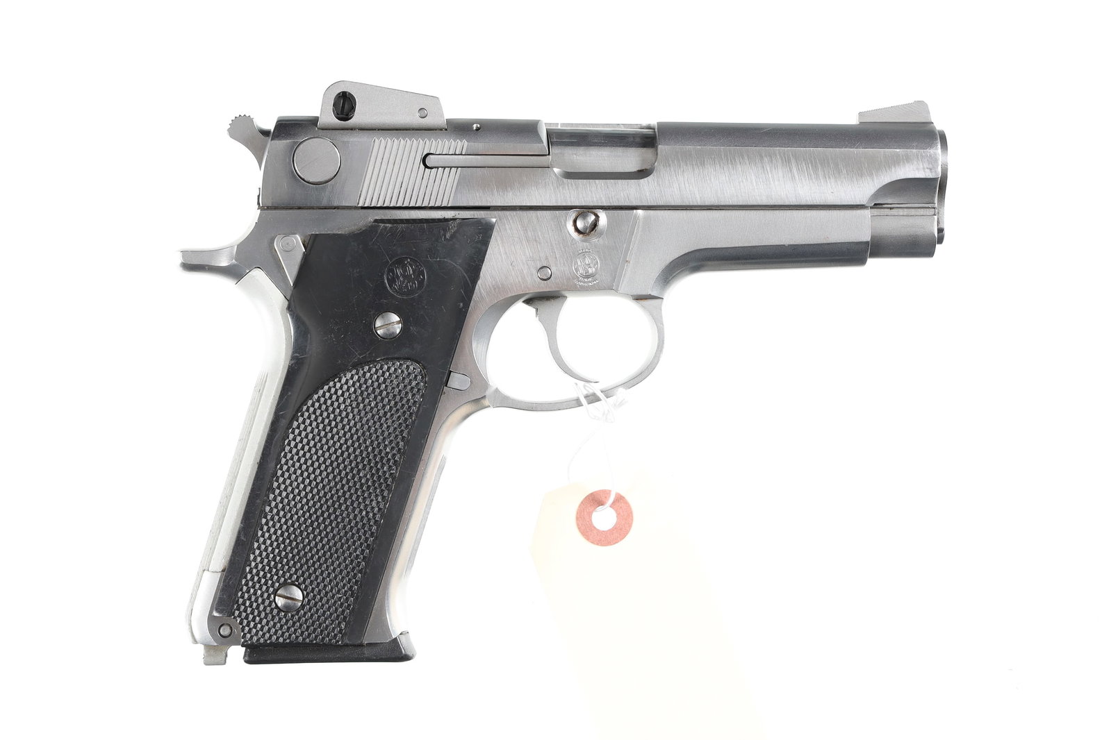 Smith & Wesson 659 Pistol 9mm: 9mm Serial # A851618 Stainless steel, factory adjustable sights, 1st Gen Smith Auto with decocking safety. Excellent overall condition with some light surface scratching. Mechanically excellent. Barre