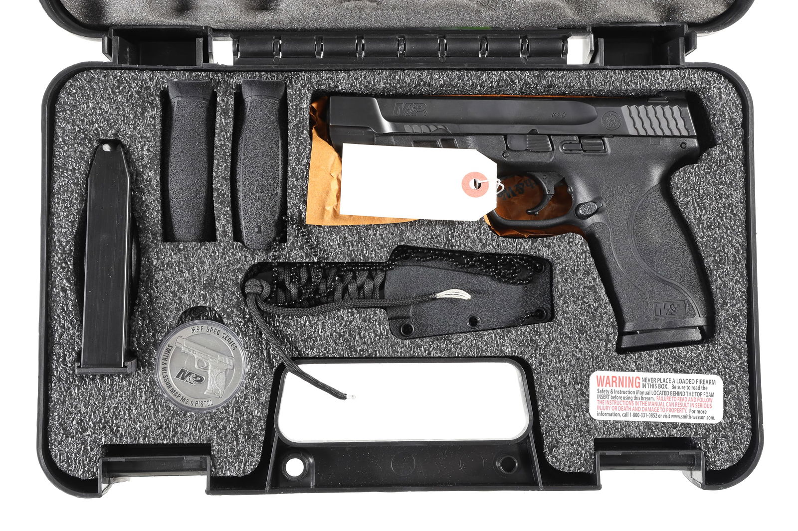 Smith & Wesson M2.0 Pistol 9mm: 9mm Serial # MFJ0728 Excellent overall in factory box numbered to gun. Includes S&W knife, medallion, 2 additional grip modules and 1 additional magazine. Mechanically Excellent Barrel 4 7/8" Modern