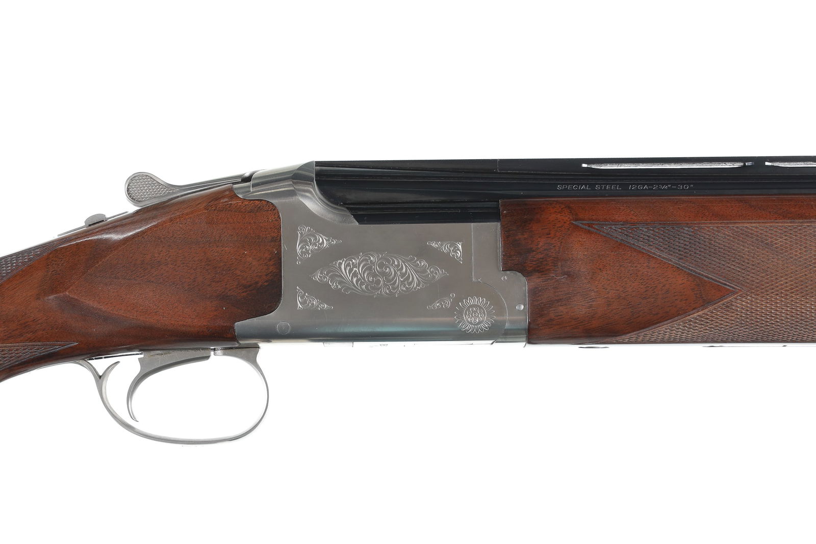 Browning Citori Grade 2 O/U Shotgun 12ga: 12ga Serial # 30340PT Wide broadway rib, with top barrel being factory fixed Full choke, and bottom barrel being factory threaded for Invector chokes, Mod Choke installed. Scroll engraved coin finishe