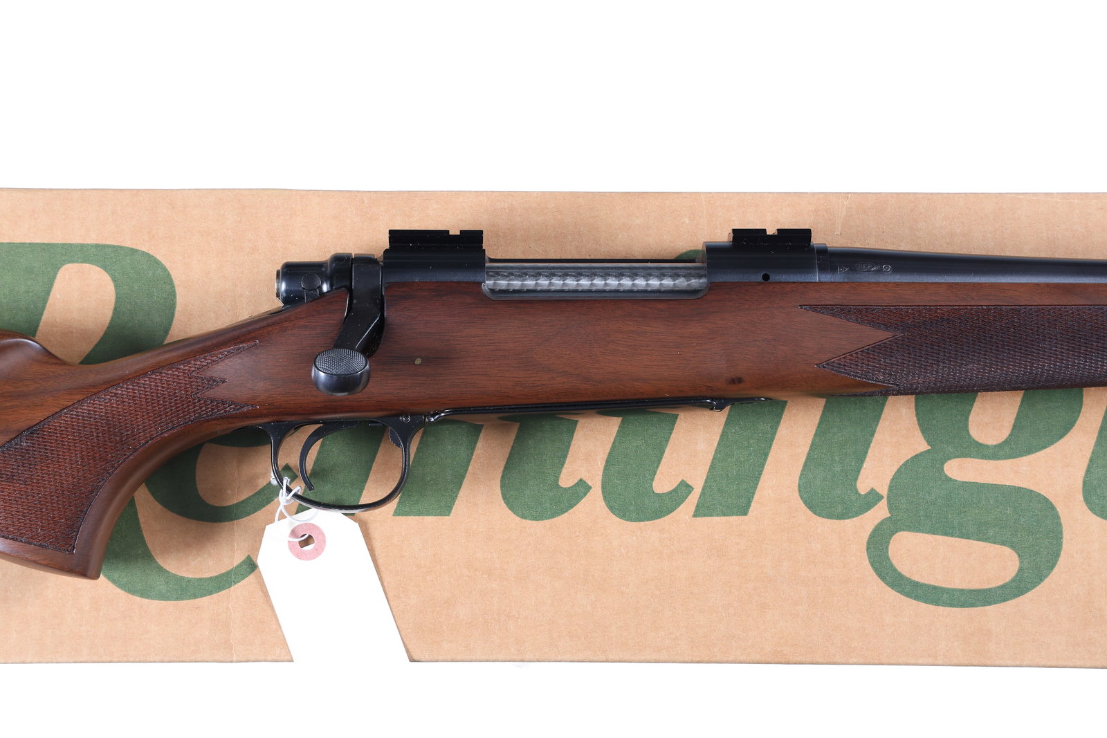 Remington 700 Classic Bolt Rifle .280 rem: .280 rem Serial # E6328847 Remington 700 Classic limited issue produced 1997. Blue finish with satin finished, checkered, pistol grip walnut stock with drop magazine floor plate. Fitted with Weaver ba