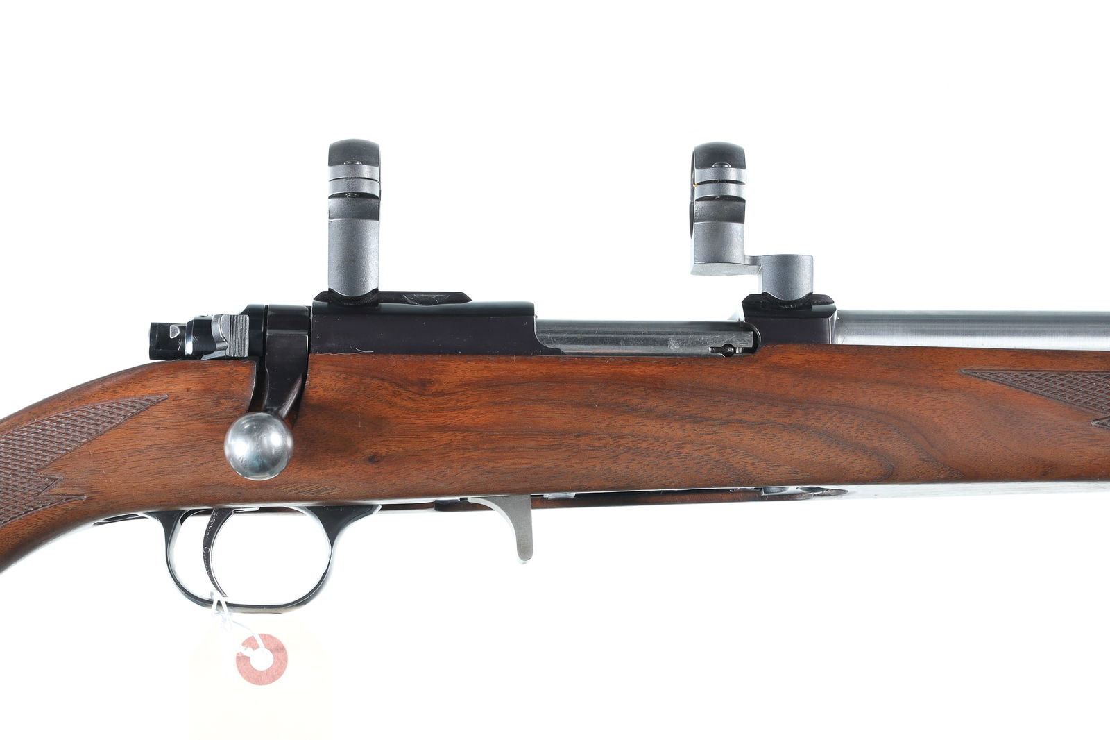 Ruger M77/22 Bolt Rifle .22 Hornet: .22 Hornet Serial # 720-01877 Custom stainless threaded barrel for suppressor use, with Leupold extended 1" rings. Rifle remains in very fine custom assembled condition with thinning varnish on stock,