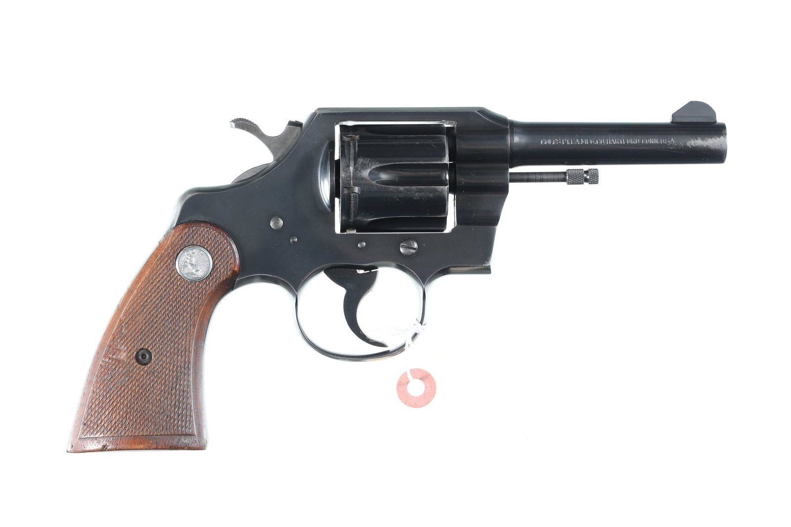 Colt Official Police Revolver .38 spl: .38 spl Serial # 892865 Very good overall condition with blue loss to cylinder from holster wear. Mechanically excellent. Barrel 4" Modern