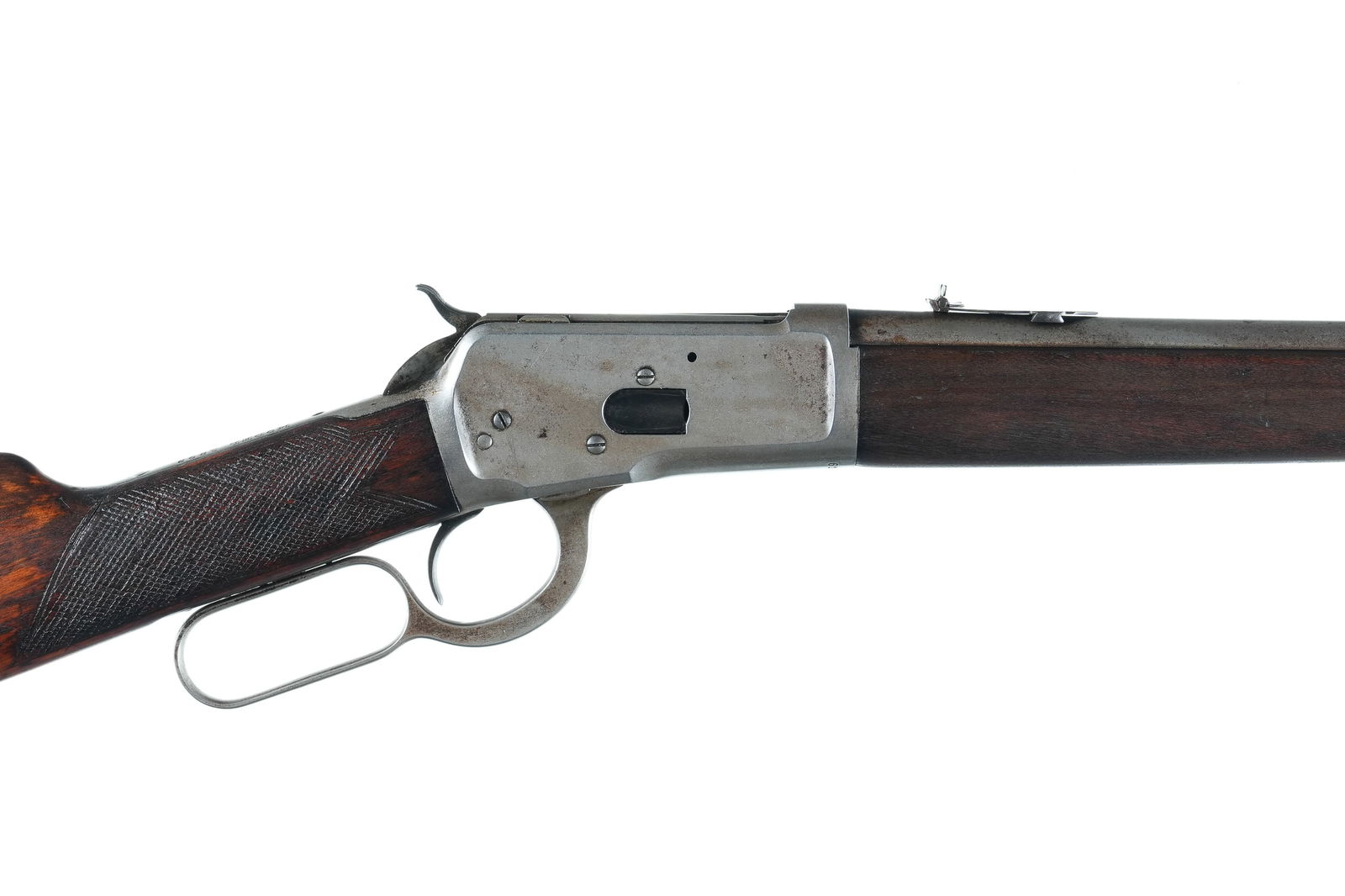 Winchester 1892 Lever Rifle .38 wcf: .38 wcf Serial # 610926 Winchester Model 1892 Saddle Ring Carbine / 20" Bbl with gum wood stocks and Saddle ring on left side. Condition. Worn from actual use with 2 leaf express rear sight. Bright bo