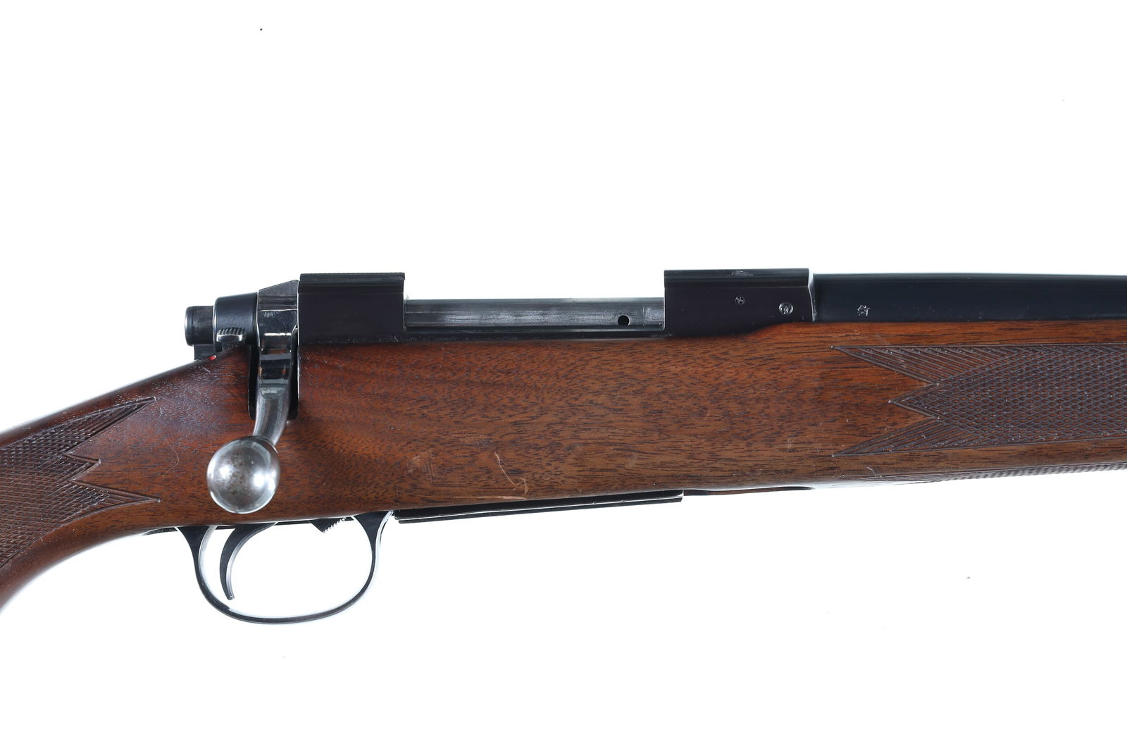 Tikka M55 Bolt Rifle .243 Win: .243 Win Serial # 550-201435 Finnish Tikka Model M55 bolt action sporting rifle with 23" threaded muzzle Bbl chambered for 243. 5 round box magazine with Sako pattern bolt. Walnut monte Carlo stock wi