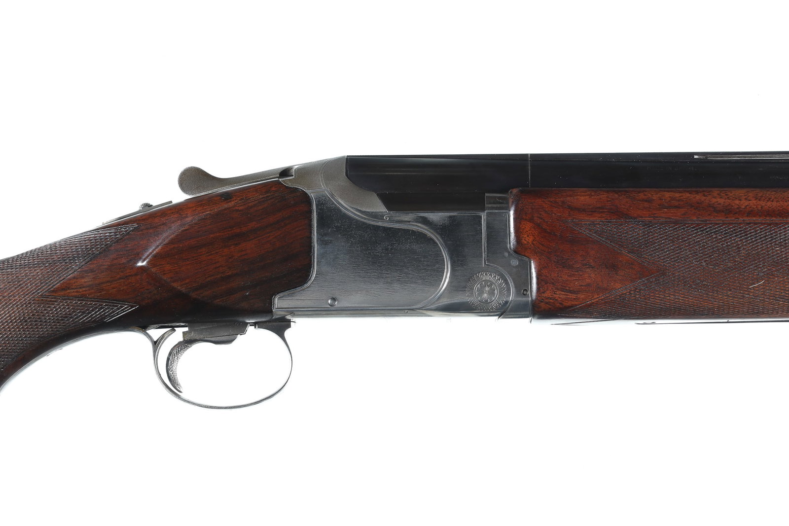 Winchester 6500 Sporter O/U Shotgun 12ga: 12ga Serial # K541058E Winchester model 6500 XTR 12 Ga over under with coin finished receiver with single selective adjustable trigger and ejectors. 28" vent rib Bbl with Win-Choke system with Mod & I