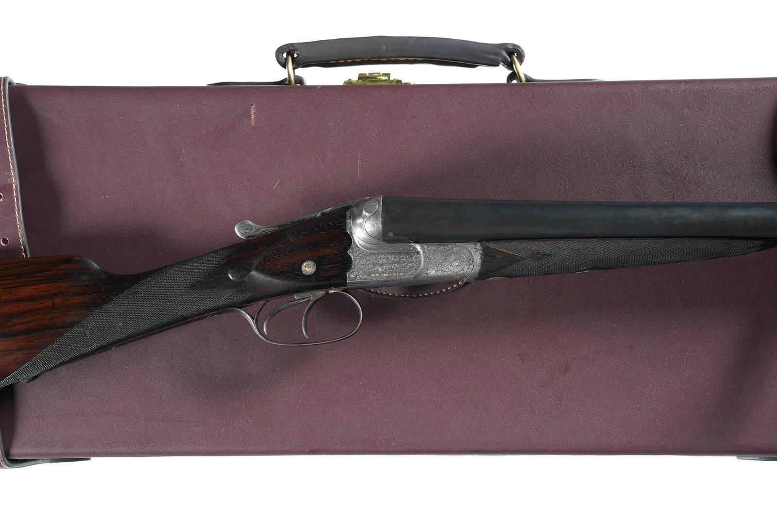 W.W. GREENER GRADE G3 SxS Shotgun 12ga: 12ga Serial # 48786 W.W. Greener Grade 3 12 Ga SxS with 2 1/2" chamber choked Cyl & Cyl with double triggers and ejectors. Greener side safety. 14 1/2" LOP. with Leather luggage case, cleaning tools a