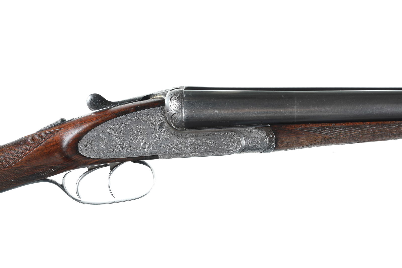 W. J. Jeffery & Co Sidelock Ejector SxS Shotg: 12ga Serial # 16761 W.J. Jeffery & Co. English 12 bore double sidle lock shotgun with bright receiver with English Rose & scroll engraving. Nicely figured oil finished walnut English pattern stocks. 2
